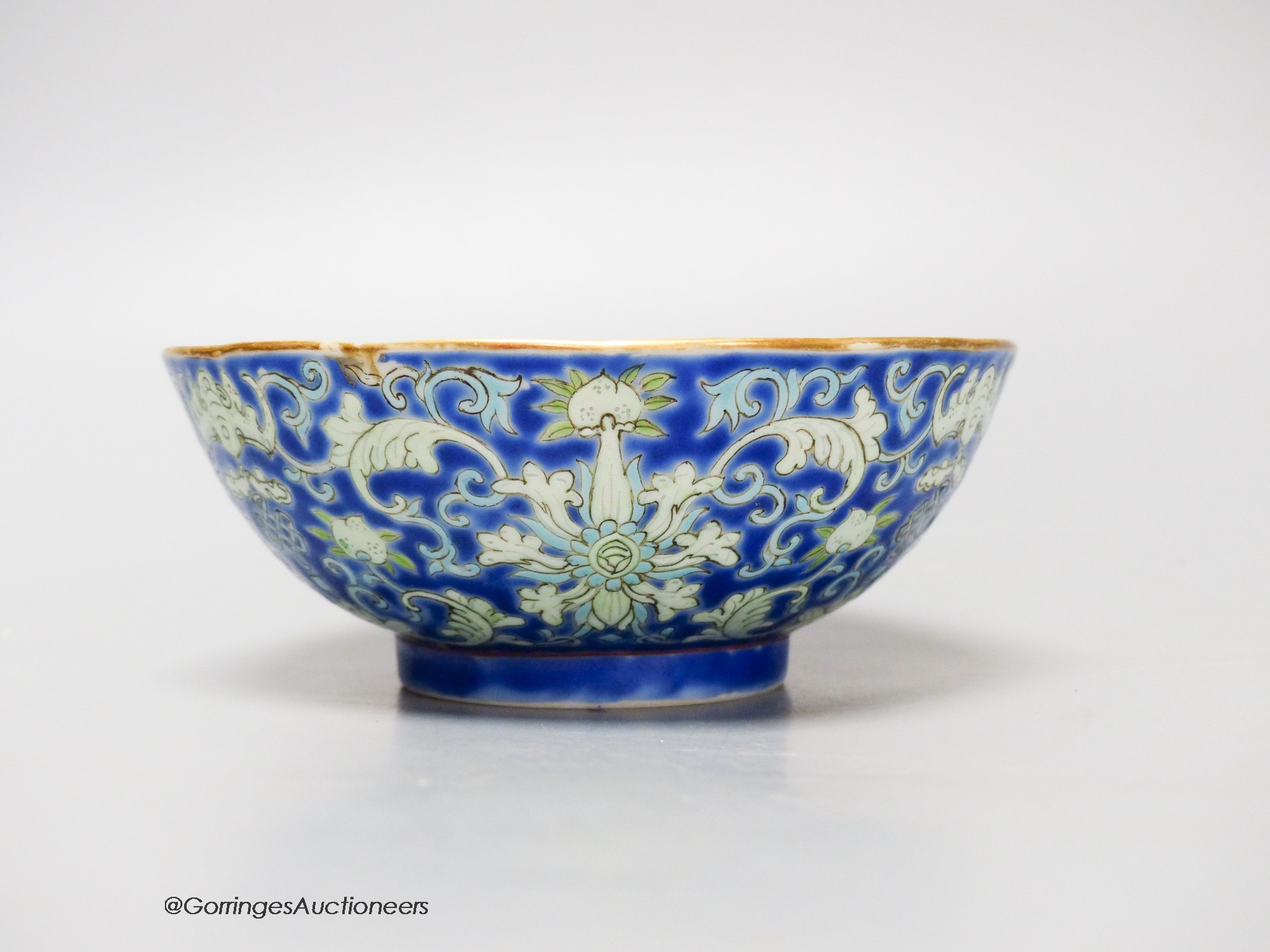 A Chinese blue ground bowl, Tongzhi mark and period (1862-74), 13cm diameter